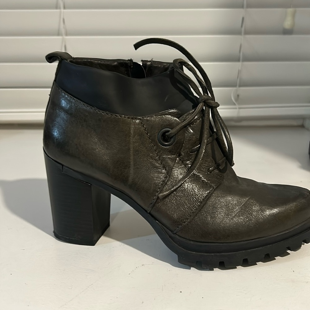 Beautiful brown and black leather combat like shoes with pointed toe.